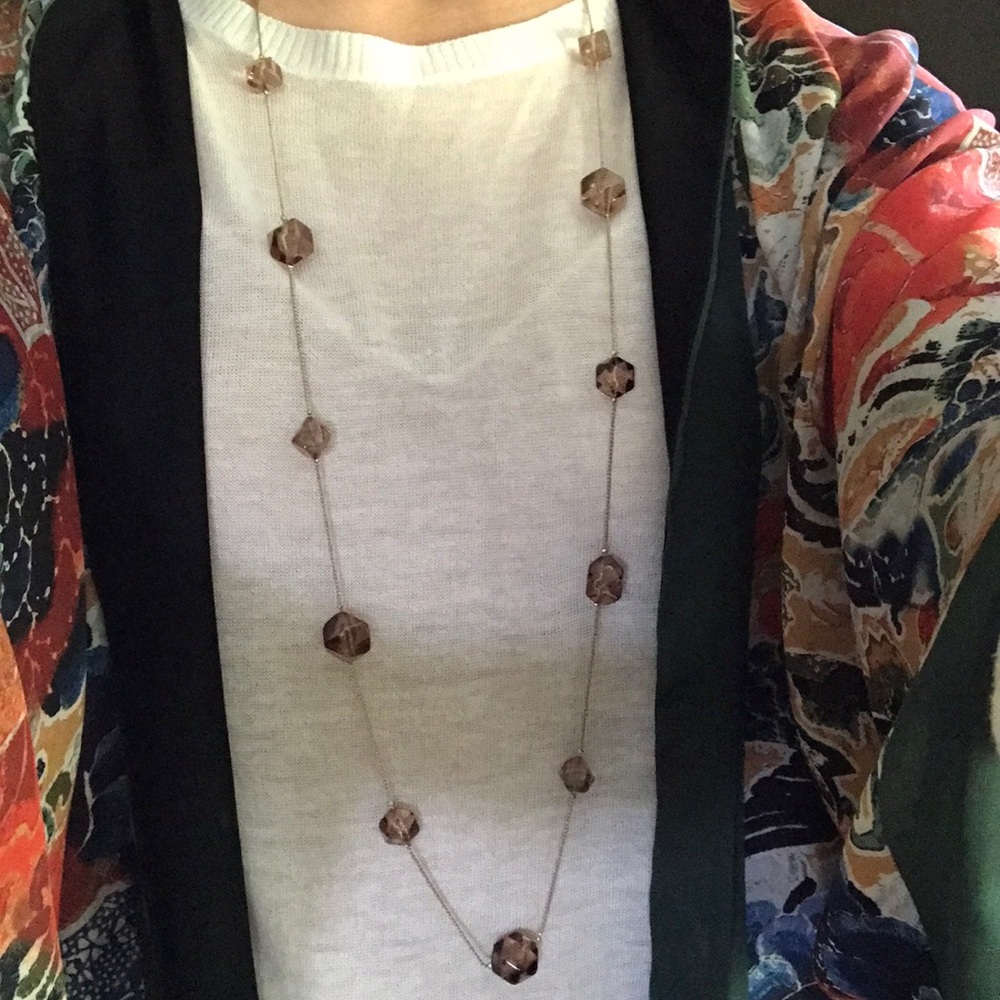Long drop necklace with brown resin-like beads